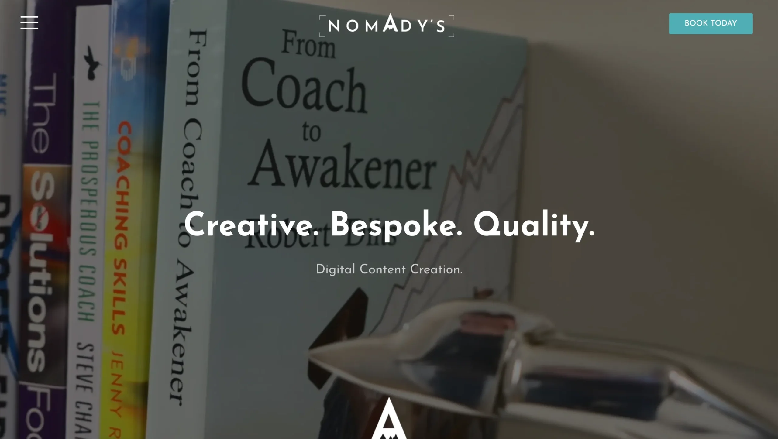 Nomady's website design hero banner by First Rate Marketing